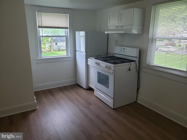 kitchen featuring light hardwood / wood-style floors, white appliances, and white cabinetry