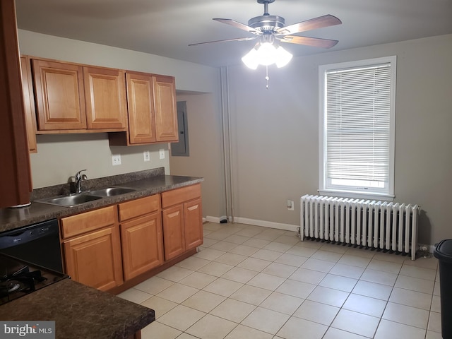 kitchen featuring ceiling fan, radiator, sink, light tile patterned floors, and dishwasher