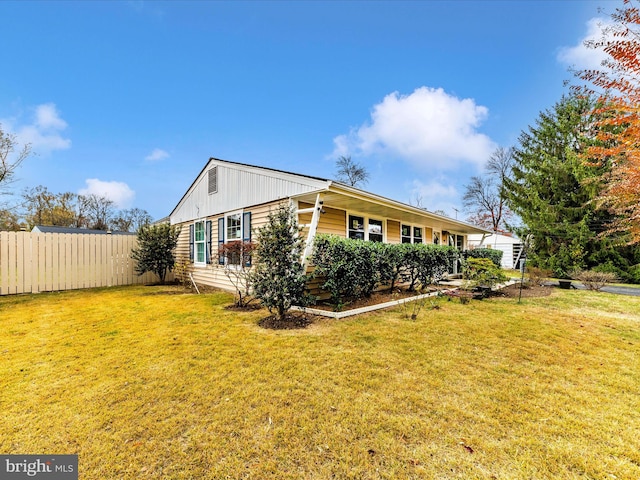 view of front of home with a front yard