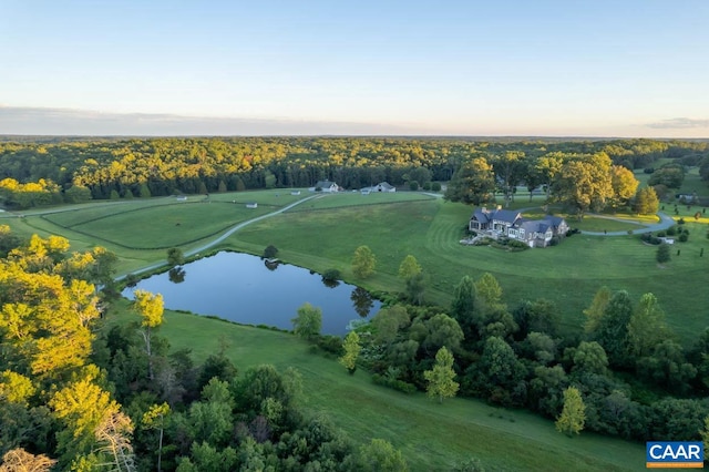 aerial view at dusk with a water view