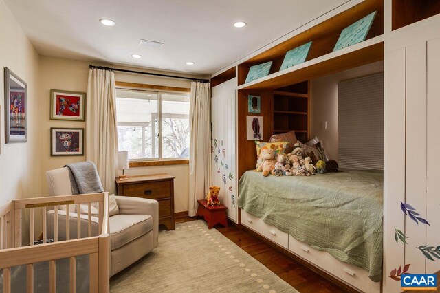 bedroom featuring wood-type flooring