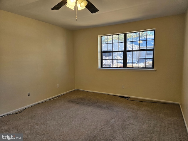 carpeted empty room with ceiling fan