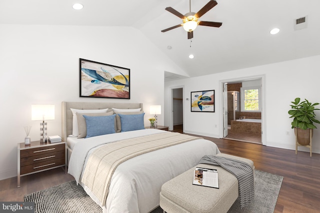 bedroom featuring ceiling fan, dark hardwood / wood-style floors, ensuite bath, and lofted ceiling