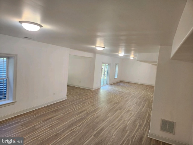 unfurnished room featuring wood-type flooring