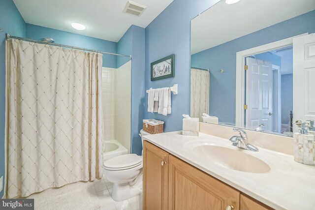 full bathroom with vanity, tile patterned flooring, toilet, and shower / tub combo with curtain