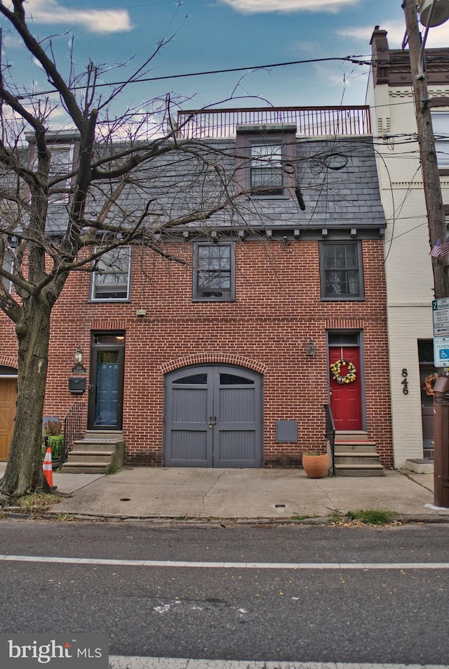 view of front of property featuring a garage