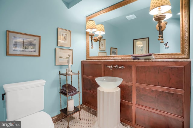 half bathroom with toilet