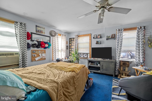 carpeted bedroom featuring cooling unit and ceiling fan