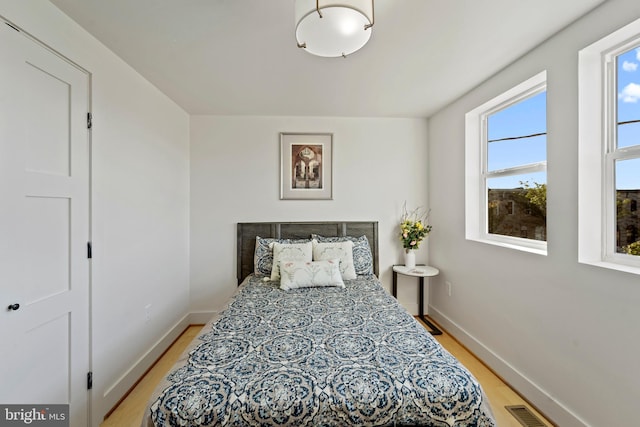 bedroom featuring light wood-type flooring