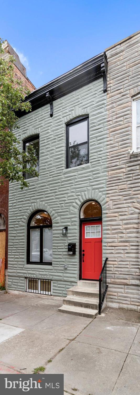 property entrance with a patio