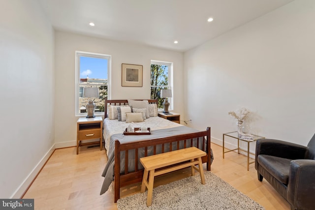 bedroom with light wood-type flooring