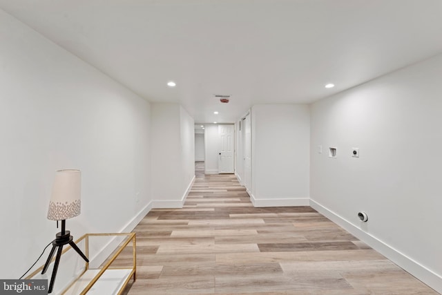 hallway featuring light hardwood / wood-style flooring