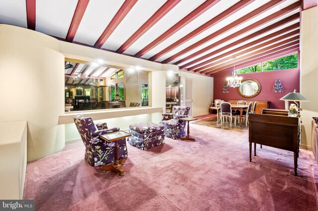 living area with a notable chandelier, lofted ceiling with beams, and carpet