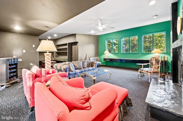 carpeted living room featuring ceiling fan