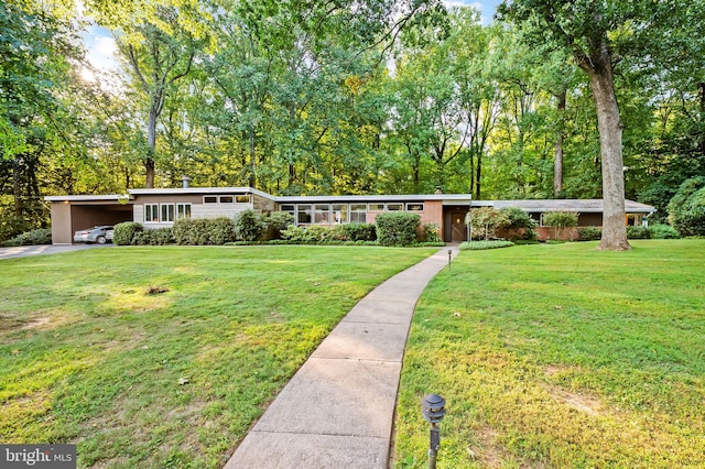 ranch-style house with a front lawn