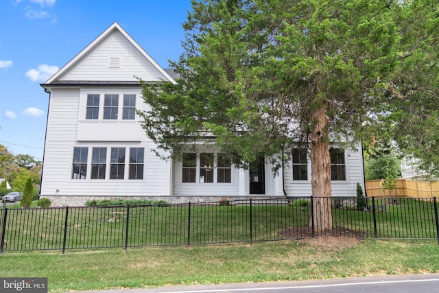 view of front of house with a front lawn