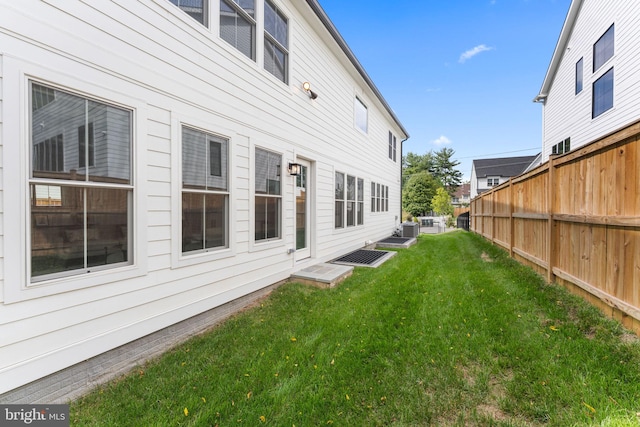 view of yard featuring central AC