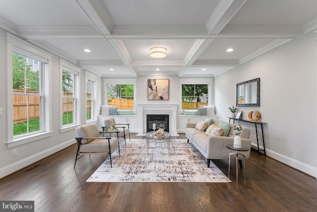 living room with coffered ceiling, ornamental molding, beamed ceiling, and dark hardwood / wood-style flooring