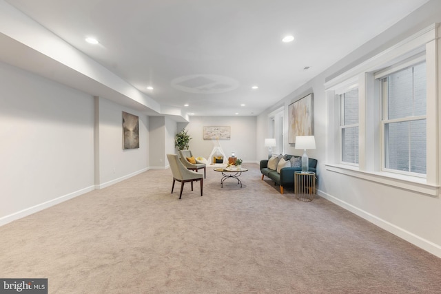 sitting room featuring carpet flooring