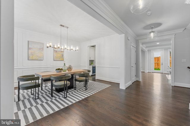 dining room featuring ornamental molding and dark wood-type flooring