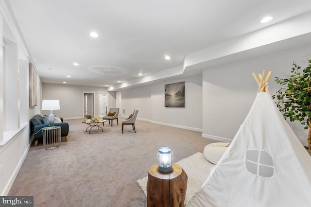 living area with carpet floors