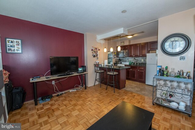 living room with light parquet floors