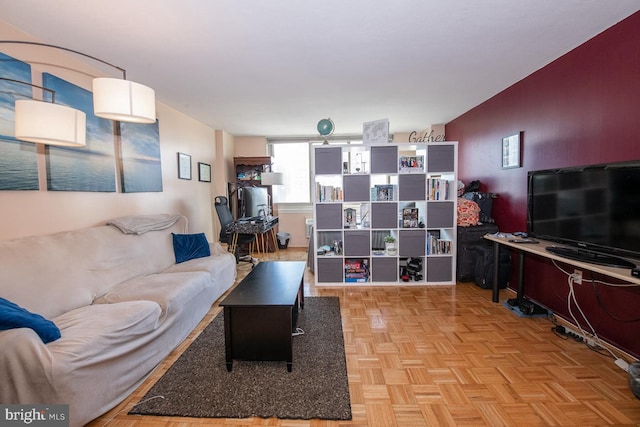 living room featuring light parquet flooring