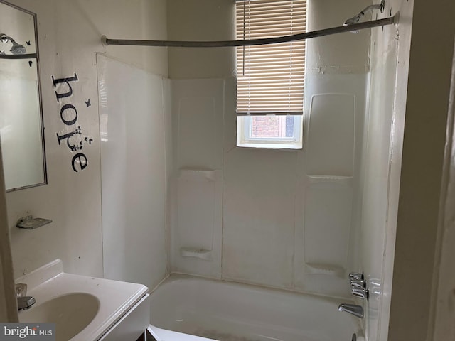 bathroom with vanity and tub / shower combination