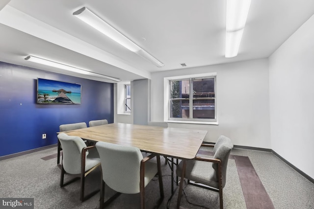 dining area with carpet