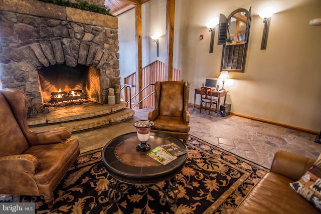 sitting room with a fireplace