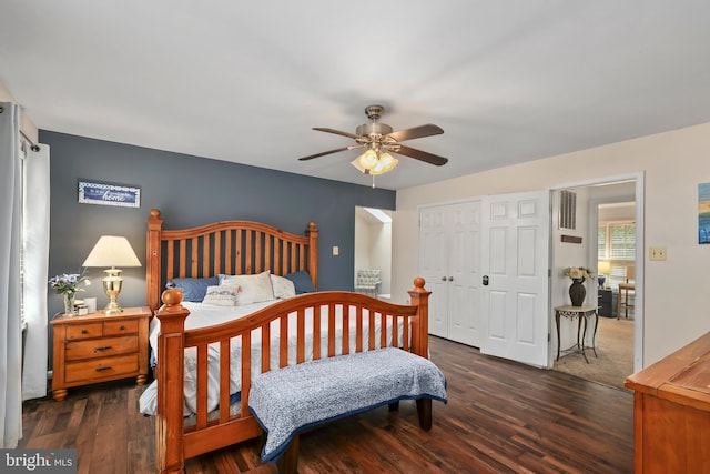 bedroom featuring ceiling fan and dark hardwood / wood-style flooring