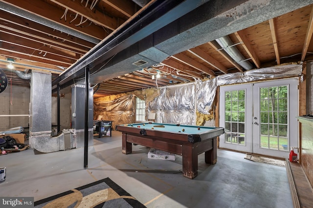 recreation room featuring concrete floors, billiards, and french doors