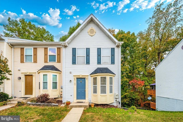 view of front of home with a front lawn