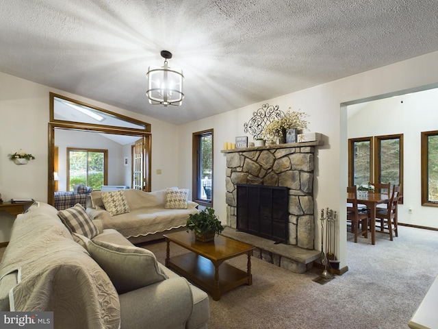 living room featuring a notable chandelier, carpet floors, a textured ceiling, and vaulted ceiling