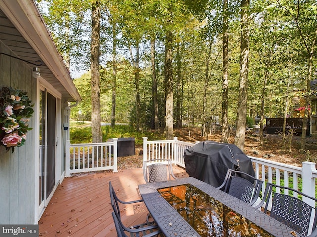 wooden terrace with grilling area