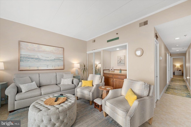 110 81st St Unit G03, Ocean City, MD 21842 - living area with light tile patterned flooring, crown molding, and recessed lighting