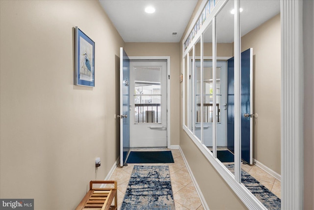 110 81st St Unit G03, Ocean City, MD 21842 - entryway with light tile patterned floors, recessed lighting, and baseboards