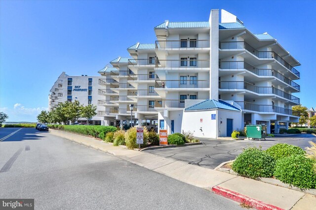 110 81st St Unit G03, Ocean City, MD 21842 - view of apartment building / complex with uncovered parking