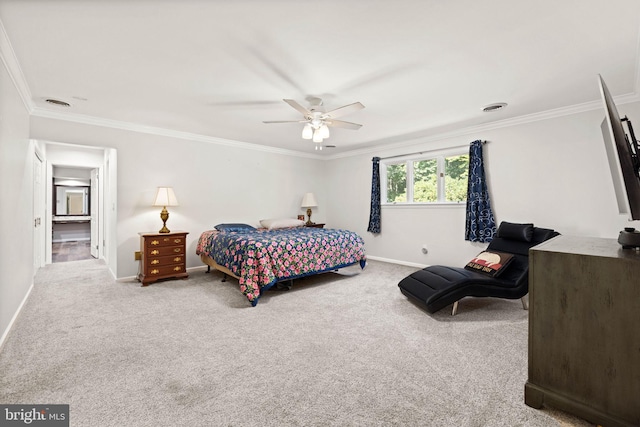 carpeted bedroom with ceiling fan and ornamental molding