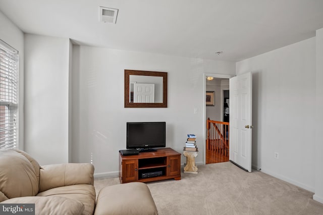 living room with light carpet