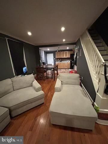 living room with wood-type flooring