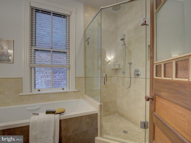 bathroom with independent shower and bath