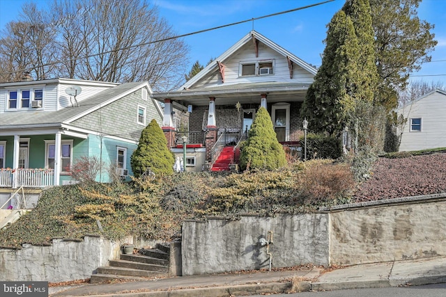 32 S Jackson St, Pottsville, PA 17901 - view of front of property with covered porch and brick siding