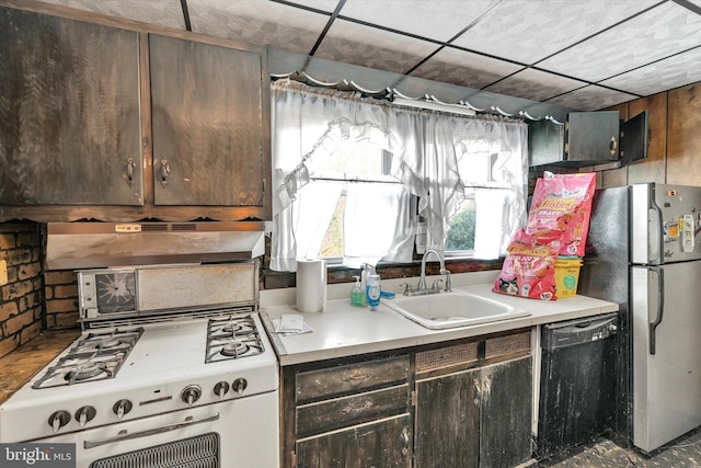 32 S Jackson St, Pottsville, PA 17901 - kitchen featuring light countertops, a sink, freestanding refrigerator, white gas range, and dishwasher