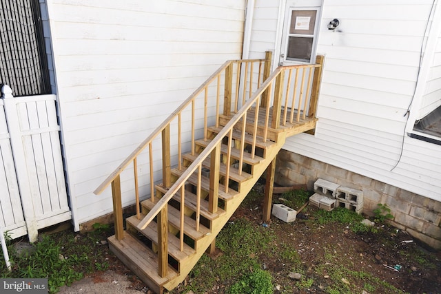 exterior space featuring wood walls