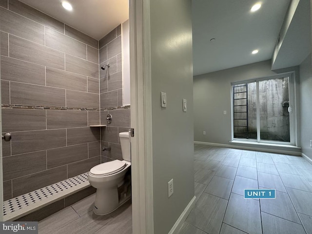 1606 Point Breeze Ave, Philadelphia, PA 19145 - full bath featuring tiled shower, toilet, baseboards, recessed lighting, and tile patterned flooring