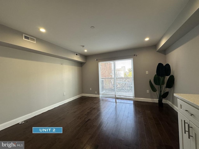 1606 Point Breeze Ave, Philadelphia, PA 19145 - empty room featuring baseboards, dark wood-type flooring, and recessed lighting