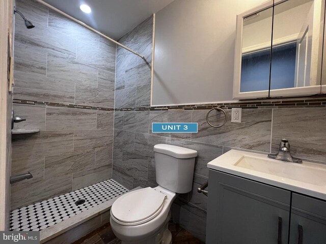 1606 Point Breeze Ave, Philadelphia, PA 19145 - full bath featuring vanity, tiled shower, and toilet
