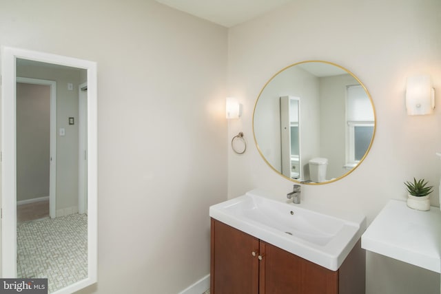 bathroom with vanity and tile patterned floors