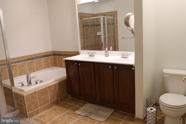 full bathroom featuring vanity, plus walk in shower, toilet, and tile patterned floors